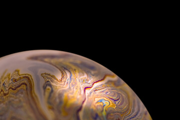 Multicolor abstract cold alien planet with an atmosphere in universe. Closeup soap bubble - 527902728