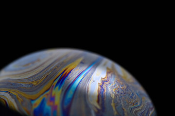 Multicolor abstract cold alien planet with an atmosphere in universe. Closeup soap bubble - 527902730