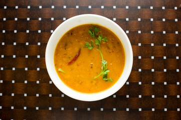 Daal Tarka served in a dish isolated on table background top view of bangladesh food