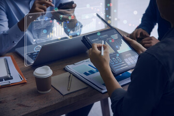 Technology and financial advisory services concert. Business teamwork and working on digital laptop computer with advisor showing plan of investment to clients at table office. Digital marketing.