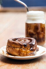 Cinnamon roll with chocolate milkshake
