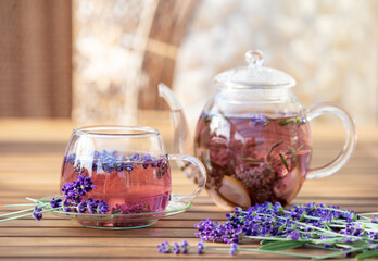 Glass cup of lavender tea.