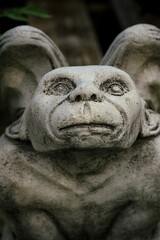 stone gargoyles in a nursery garden