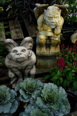 Obraz premium stone gargoyles in a nursery garden