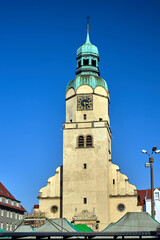Fototapeta na wymiar bell tower with a clock in an historic church