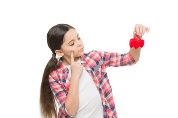 Be patient. love and people concept small girl valentines day decoration. little present for her valentine. kid having fun while prepare for party. Sweet girl with red heart. fill heart with love