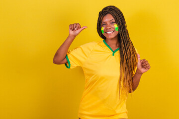 black woman young brazilian soccer fan. like sign, liked, approval, cool. soccer brazil.