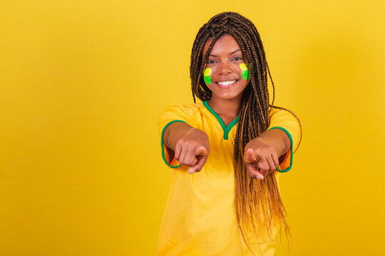 black woman young brazilian soccer fan. pointing at camera, choose, choosing you.