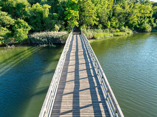 Looking down at the wood bridge at Sunken Meadow State Park