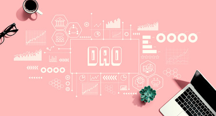 DAO- Decentralized Autonomous Organization theme with a laptop computer on a pink background
