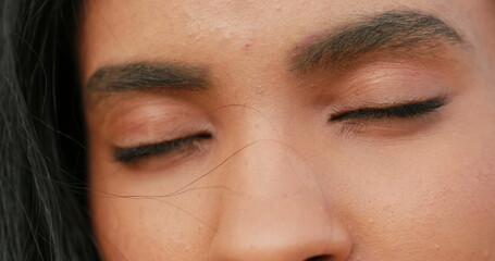 Fototapeta premium African woman opening eyes, macro closeup of young black girl eyes