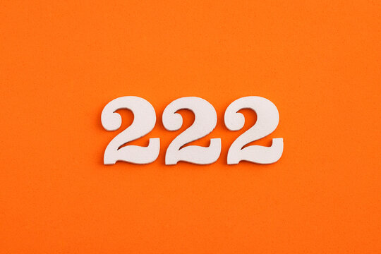 Number 222 - On orange foam rubber background