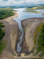 Drought conditions are shown through drone shots of Stocks Reservoir
