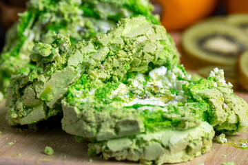 green cake with kiwi and gooseberry flavor