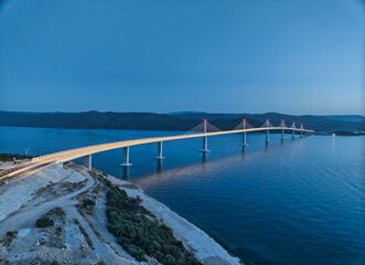 Aerial of the Peljesac bridge at dusk