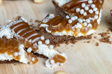 chocolate tartlet with cream filling and salted caramel with nuts