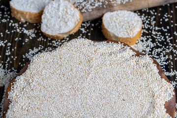 wheat grain baguette sprinkled with sesame seeds