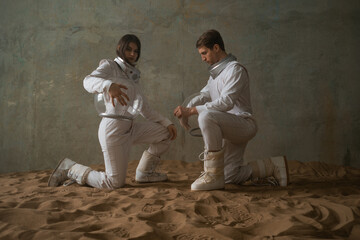 To make contact, the concept of a relationship with a partner. A man and a woman in retrofuturism...