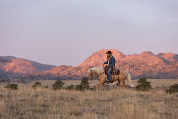 Wyoming Cowgirl at Work in the Fall