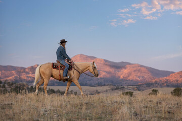 Wyoming Cowgirl at Work in the Fall