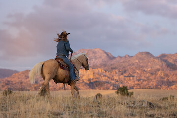 Wyoming Cowgirl at Work in the Fall