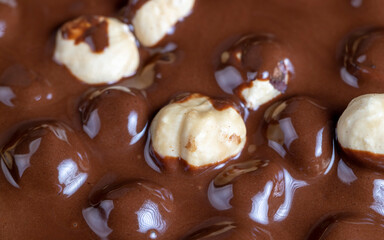 real milk chocolate while cooking with hazelnuts