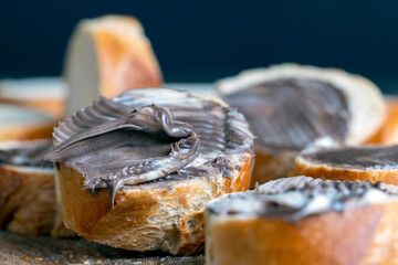 baguette with sweet chocolate butter on a board