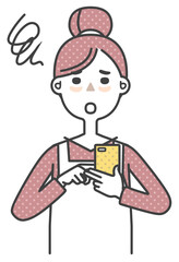 Housewife uses mobile phone to find out what dish to cook