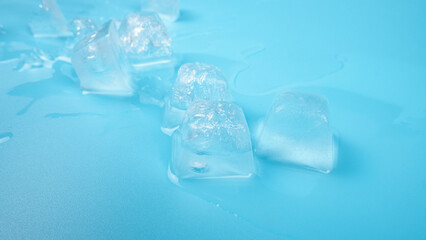 ice cubes closeup on blue background.