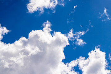 Blue sky with light clouds in windy weather