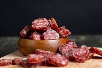 Cut the finished sausage into pieces on a cutting board