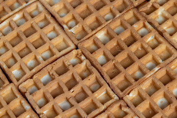 soft sweet waffles on the table, close up