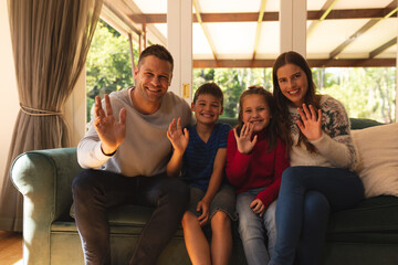 Portrait of caucasian family spending time at home together