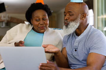 Senior african american couple spending time at home together