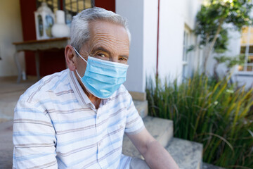 Portrait of senior caucasian man spending time at home