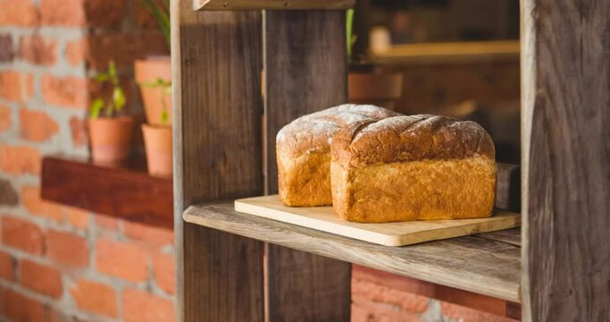 Animation of bread loafs on shelves in schop