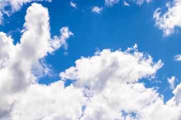 Blue sky with light clouds in windy weather