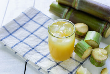 Sugar cane juice, Sugar cane drink with ice. white background, top view