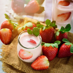 Healthy food of yogurt, Strawberry Yogurt,yogurt with fresh strawberry, wood background