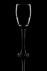 Empty wine glass on a black background
