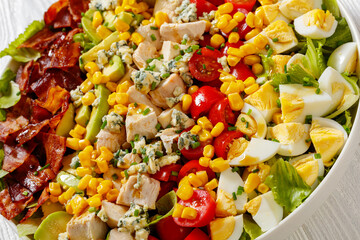 American garden salad on plate, top view