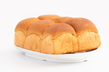 Oven Fresh Pillowy Bread Rolls Bombay Ladi Pav Buns Bread Is Made In Local Bakeries In India. Used In Traditional Street Food Like Paav Bhaji Or Vada Paw Or Misal Paaw. White Background And Copy Space