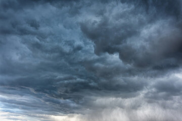 Naklejka na ściany i meble Powerful storm clouds in the evening.
