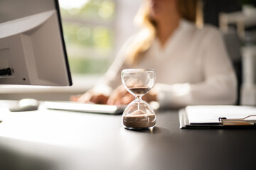 Late Invoice And Billing Deadline With Hourglass