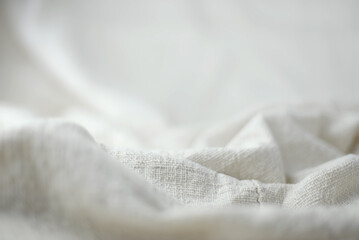 White cotton pile Hand-woven background, focus on the middle and blurry in the front and back