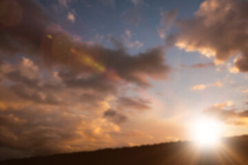 Fototapeta na wymiar Silhouette landscape against sky with sun 