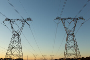 The evening electricity pylon silhouette - obrazy, fototapety, plakaty