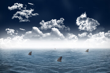 Naklejka premium Shark infested sea under dark sky
