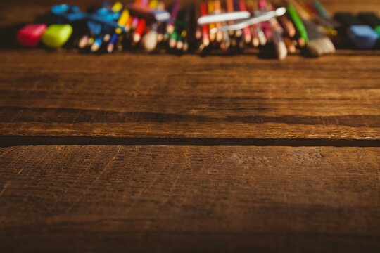 Color pencils on wooden table