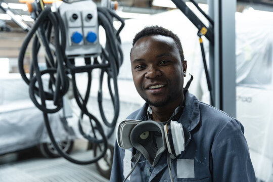 Portrait of African American man car painter